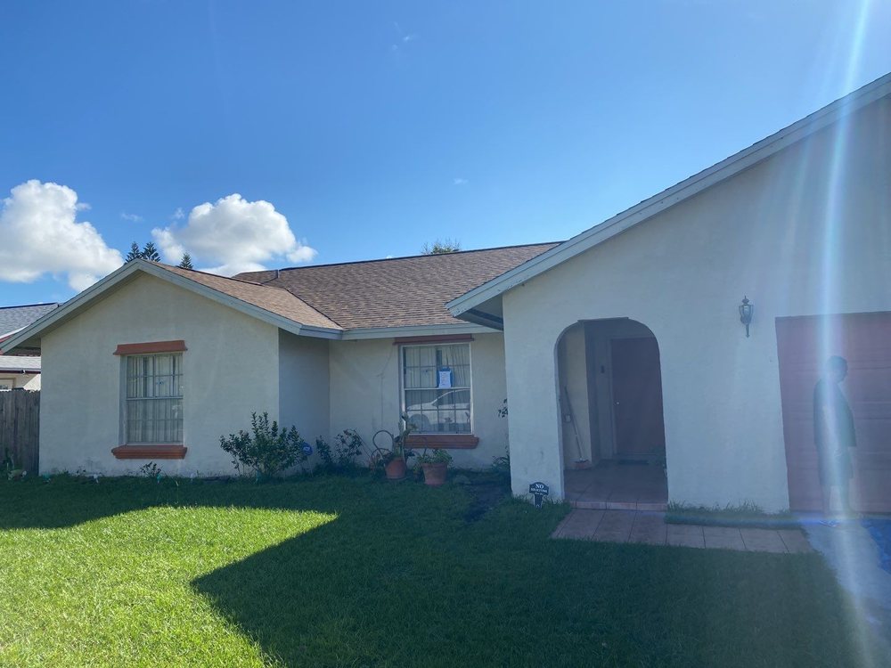 Slide of Roofing Pros USA