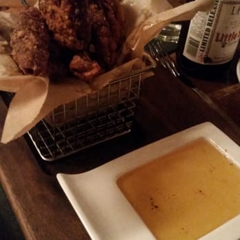 Carson Kitchen - Crispy Chicken Skins with honey. - New American Near Me - Las Vegas, Nevada