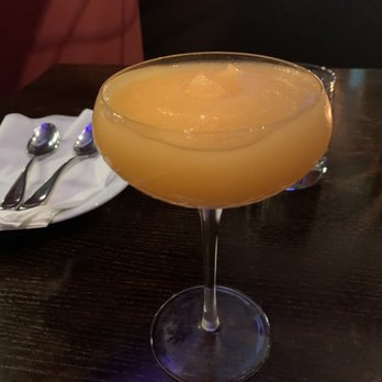 Dominion Bar + Kitchen - Peach Bellini cocktail - Canadian (New) Near Me - Surrey, British Columbia