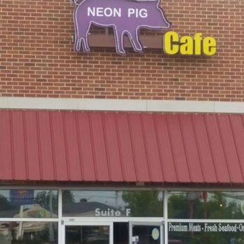 Neon Pig - Outside in a strip mall area across from hotels - Butcher Near Me - Tupelo, Mississippi Neon Pig - Outside in a strip mall area across from hotels - Butcher Near Me - Tupelo, Mississippi