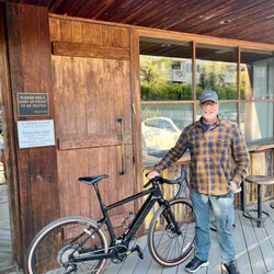 The Bike Shop at Pedalers Fork - Posing outside the shop after expert assembly by Derek.