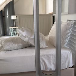 Hostellerie du Château - No AC. A fan was offered. Top floor duplex suite. The roof is so low you will hit it constantly if you're over 5 feet tall.