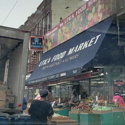 Utica Fruit Market - Front sidewalk