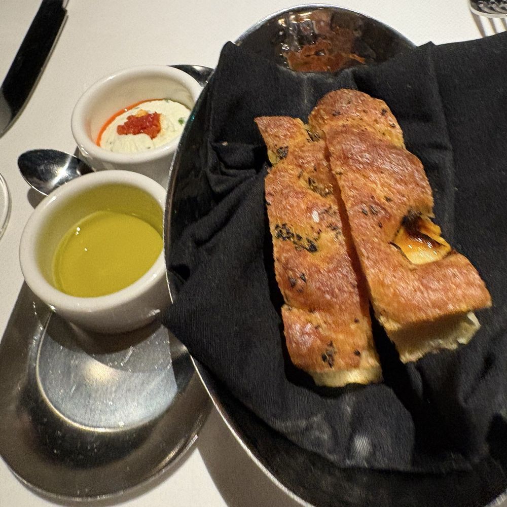 Focaccia bread...so good specially paired with the spread Focaccia bread...so good specially paired with the spread