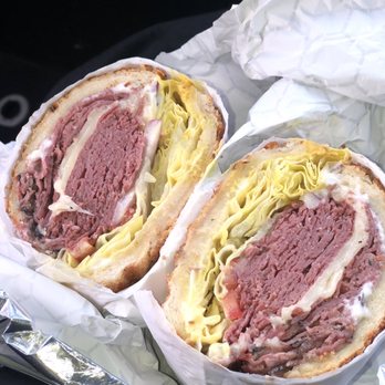Bara's Deli - Bread: Dutch Crunch Cheese: Swiss Meat: Corned Beef and Pastrami Toppings: Lettuce, Tomatoes, Mayo, Mustard, and Onions Hot Sandwich - Delis Near Me - San Leandro, California