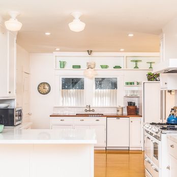 Nott & Associates - a kitchen with white cabinets and appliances - Architects Near Me - South Pasadena, California Nott & Associates - a kitchen with white cabinets and appliances - Architects Near Me - South Pasadena, California
