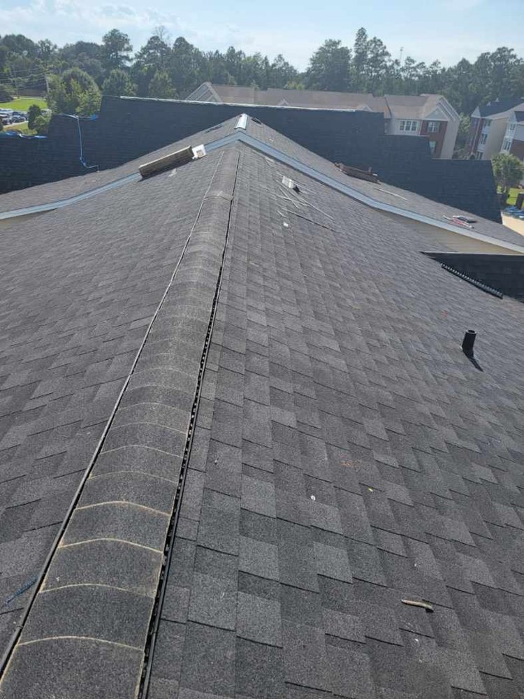 Slide of Exstream Roofing