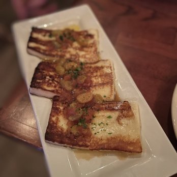 Cafe La Trova - queso frito: fried haloumi cheese, tomato-raisin-jerez stew with crunchy capers = $16 - Cocktail Bars Near Me - Miami, Florida