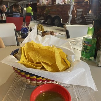 Tacos Arriba Juarez - a basket of chips and a bowl of salsa - Food Trucks Near Me - Miami, Florida Tacos Arriba Juarez - a basket of chips and a bowl of salsa - Food Trucks Near Me - Miami, Florida