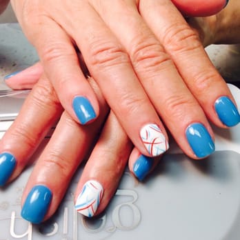 Polished Nail Bar - We are looking at ocean blue color with a rockstar look of wavy red and blue on white. Discuss your nail looks with your tech. - Nail Salons Near Me - Lafayette, Indiana