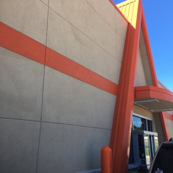 Whataburger - a car parked in front of a building - Burgers Near Me - Willis, Texas