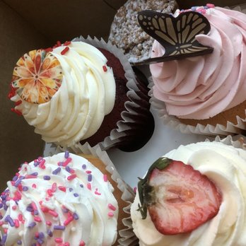 Aloha Bakery And Cafe - Strawberry shortcake cupcake, raspberry filled, red velvet and buttercream. In the back is the mini apple crumb bite. - Bakeries Near Me - Boynton Beach, Florida Aloha Bakery And Cafe - Strawberry shortcake cupcake, raspberry filled, red velvet and buttercream. In the back is the mini apple crumb bite. - Bakeries Near Me - Boynton Beach, Florida