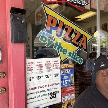 Tony's Pizza - a man sitting at a table - Pizza Near Me - Boulder City, Nevada