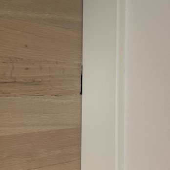 Uniq Floors - Installed baseboards and didn't fill gaps - Flooring Near Me