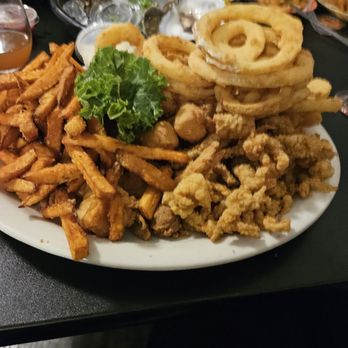 Dan's Clam Stand - Admiral platter. Fried clams, large shrimp, scallops, and whitefish. With sides of o ion rings and sweet potatoes - Seafood Near Me - Crystal River, Florida Dan's Clam Stand - Admiral platter. Fried clams, large shrimp, scallops, and whitefish. With sides of o ion rings and sweet potatoes - Seafood Near Me - Crystal River, Florida