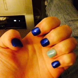 Nailtek - A shiny dark blue with a like sparkly blue on both my ring fingers I did not realize the color until after it had dried