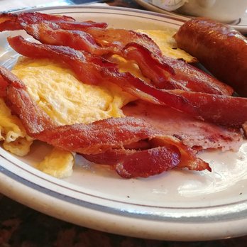 Washington Square Diner - Scrambled eggs, bacon, ham-steak, and sausage from the "Lumberjack" breakfast. - Diners Near Me - New York, New York Washington Square Diner - Scrambled eggs, bacon, ham-steak, and sausage from the "Lumberjack" breakfast. - Diners Near Me - New York, New York