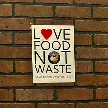 Deccan Grill - a sign on a brick wall - Indian Near Me - Irving, Texas