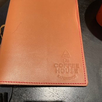 the coffee house experience - The menu is a leather case - Coffee & Tea Near Me