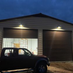 General Electrical Services - gooseneck style sconces with photocell to come on at night and stay off during the day