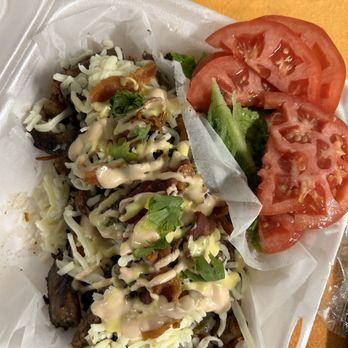 Super Creative Food - a sandwich and a tomato - Food Trucks Near Me - Tampa, Florida