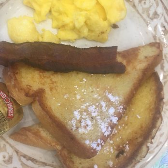 Another Broken Egg Cafe - Kid's French Toast which comes with eggs, bacon and a drink - Breakfast & Brunch Near Me - Winter Park, Florida Another Broken Egg Cafe - Kid's French Toast which comes with eggs, bacon and a drink - Breakfast & Brunch Near Me - Winter Park, Florida