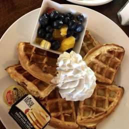 Waffles with fruit on the side.. so good Waffles with fruit on the side.. so good