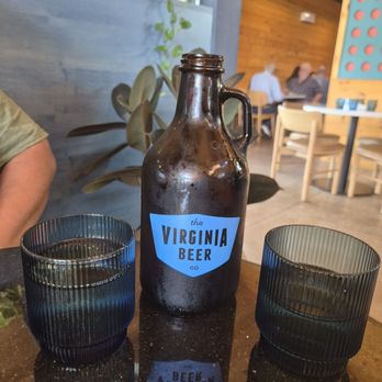 The Kitchen - Virginia beer in an amber, glass bottle is filled with drinking water. - Brewpubs Near Me - Yorktown, Virginia The Kitchen - Virginia beer in an amber, glass bottle is filled with drinking water. - Brewpubs Near Me - Yorktown, Virginia