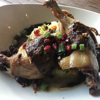 Naschmarkt - Campbell - Duck Confit: perfectly prepared, tender duck legs with spaghetti squash and a mole-like sauce. Yummy - Austrian Near Me - Campbell, California