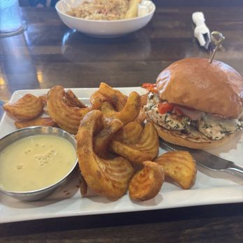 T.J. Hooligan’s - Smothered chicken sandwich - Breakfast & Brunch Near Me - Eden Prairie, Minnesota T.J. Hooligan’s - Smothered chicken sandwich - Breakfast & Brunch Near Me - Eden Prairie, Minnesota