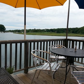 Old Mill Inn - Beautiful deck view. - Seafood Near Me - Mattituck, New York Old Mill Inn - Beautiful deck view. - Seafood Near Me - Mattituck, New York