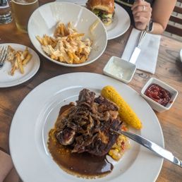 Pork chop, fries, and burger