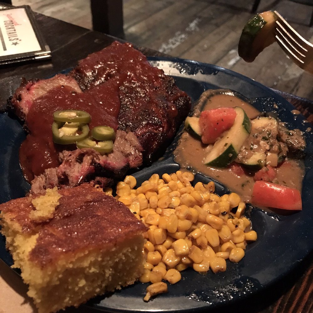 Dinosaur Bar-B-Que - Platter. Note lackluster sides (not very Cajun corn and cucumber salad swimming in dressing). - Barbeque Near Me - Troy, New York Dinosaur Bar-B-Que - Platter. Note lackluster sides (not very Cajun corn and cucumber salad swimming in dressing). - Barbeque Near Me - Troy, New York