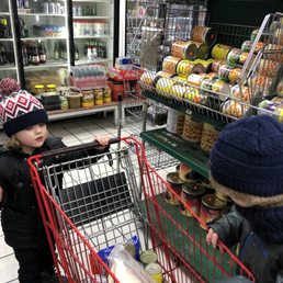 a little boy in a grocery store
