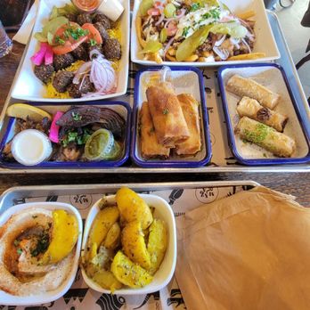 Mazra - Falafel plate, baklava roasted garlic potato, hummus, mushroom kebab and shawarma fries - Mediterranean Near Me - San Bruno, California