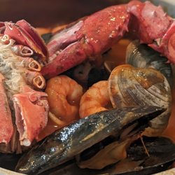 Mar Belo - Marascada red: delicious tomato broth w/ seafood and a side of yellow rice