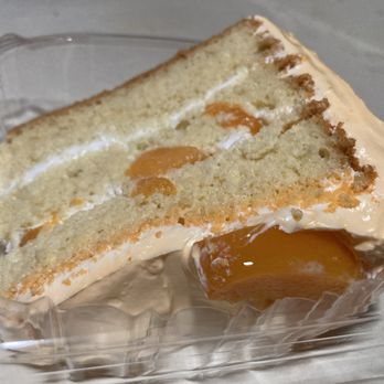 Capy - Peach tres leches cake slice. - Bakeries Near Me - New York, New York