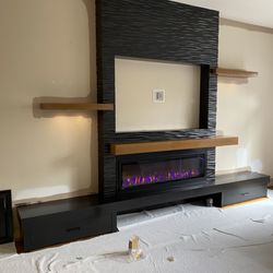 Belman Electric - Custom fireplace with TV niche.