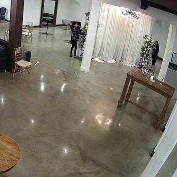 Mellie Bee Events - Security footage showing Melissa and Thaolinh breaking down the arch - Wedding Planning Near Me