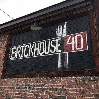 Brickhouse 40 - Side wall painting near parking - American Near Me - Granby, Colorado
