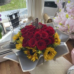 Jireh Flowers & Boutique - Roses and Sunflowers
