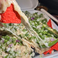 Street Tacos Al Vapor - Chicken Nachos! I asked for No sour cream and no beans.