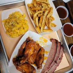 Woody's Q Shack - Wings lacked sauce, brisked dry asf, mac basic cold, fried good but cold