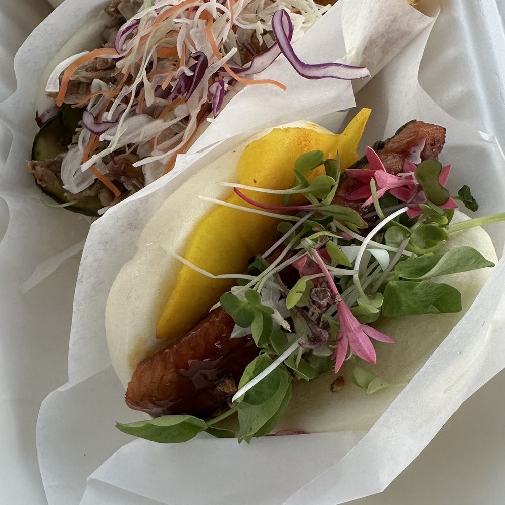 1 duck bao bun and one eel bao bun. Plus a side of sautéed zucchini 1 duck bao bun and one eel bao bun. Plus a side of sautéed zucchini