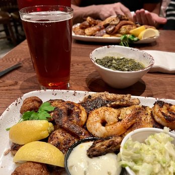 Mambo’s - Fisherman's platter blackened instead of fried with collard greens and a local Abita beer - Cajun/Creole Near Me - New Orleans, Louisiana Mambo’s - Fisherman's platter blackened instead of fried with collard greens and a local Abita beer - Cajun/Creole Near Me - New Orleans, Louisiana