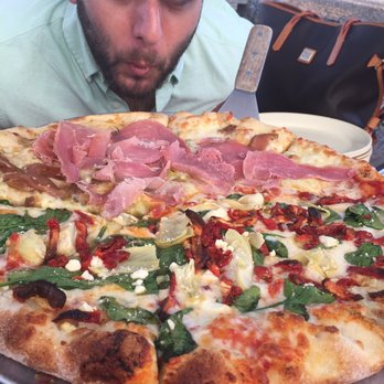 Fralo's - Half and half specialty pizza - half pear/prosciutto and half Mediterranean - Pizza Near Me - San Antonio, Texas