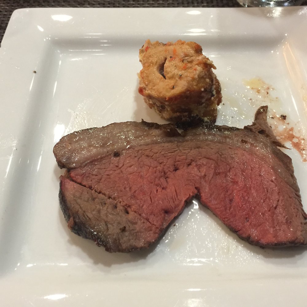 Rodizio Grill Brazilian Steakhouse Estero - Bife con Alho - garlic beef and parmesan pork - Steakhouses Near Me - Estero, Florida Rodizio Grill Brazilian Steakhouse Estero - Bife con Alho - garlic beef and parmesan pork - Steakhouses Near Me - Estero, Florida