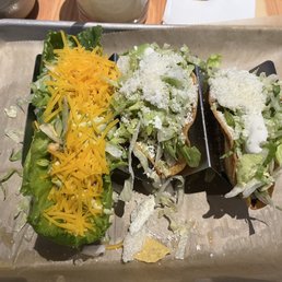 Naked chicken taco Hard shell tacos of chicken and barbacoa Naked chicken taco Hard shell tacos of chicken and barbacoa