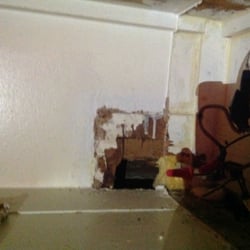 Mr. Handyman of South Montgomery County - One of the new holes in my wall.  Mr. Handyman requested $1520 for this service, plus another $500 to fix it in 2 weeks.