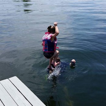 Deer Run Cabins Resort - jumping off swim platform on private resort dock - Resorts Near Me - Mountain Home, Arkansas Deer Run Cabins Resort - jumping off swim platform on private resort dock - Resorts Near Me - Mountain Home, Arkansas